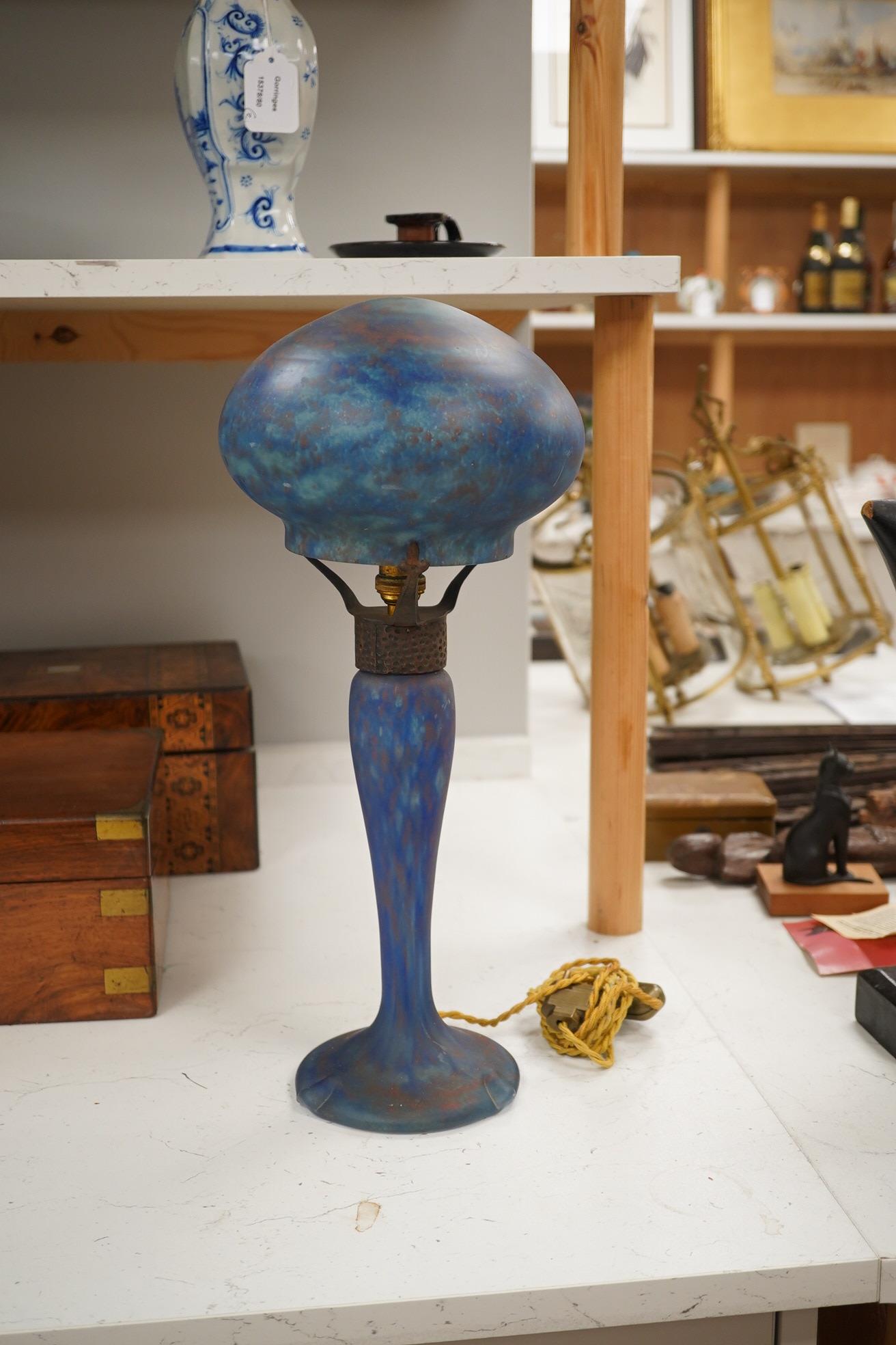 Art Nouveau, ‘Delatte’ mushroom blue glass lamp with hammered metal mount, 45cm high. Condition - good